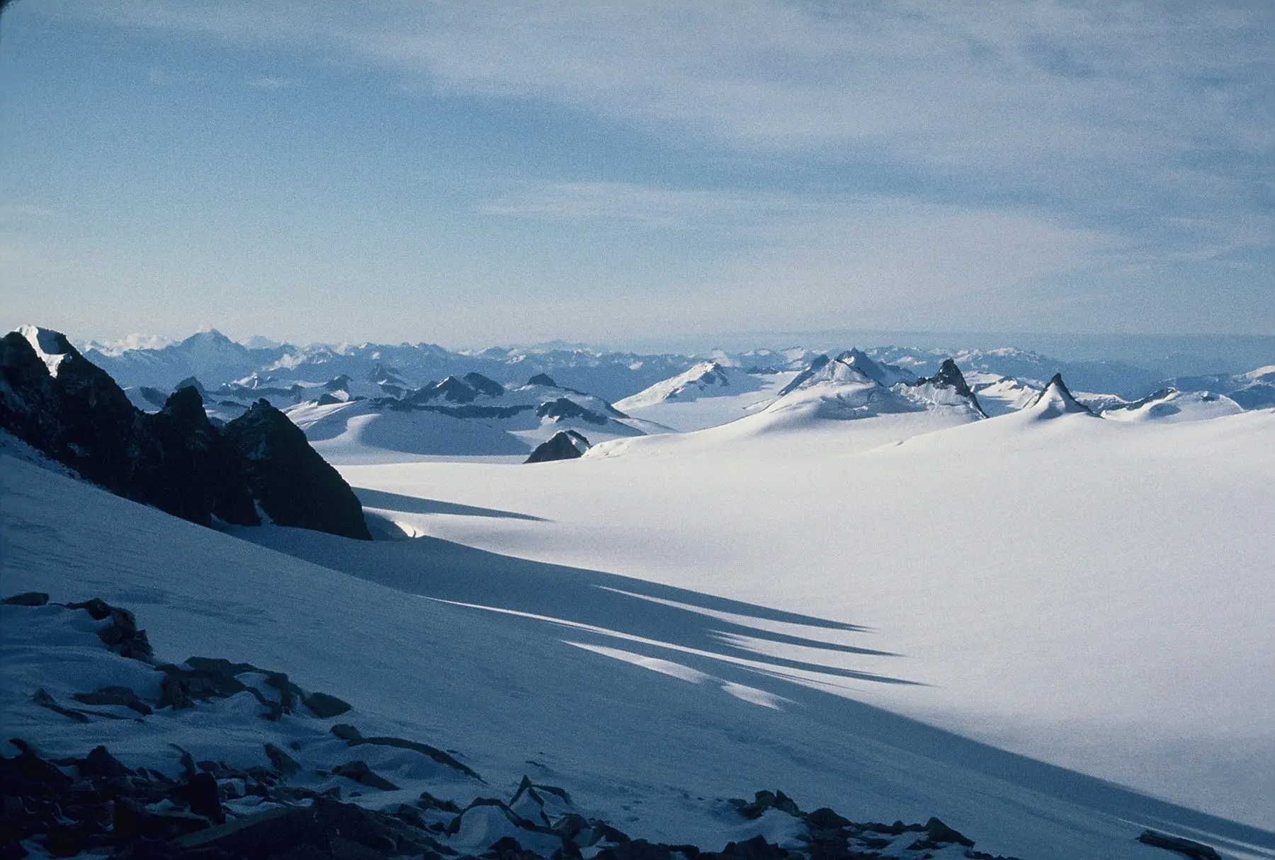 The Juneau Icefield, pictured here in 1968, resembles nearly all of Southeast Alaska during the last ice age, a time when many islands were buried by ice and snow. Glacial ice began to melt starting around 17,000 years ago, but several thousand years passed before most of the lands in Southeast Alaska were exposed. Photo by Tom Ager.