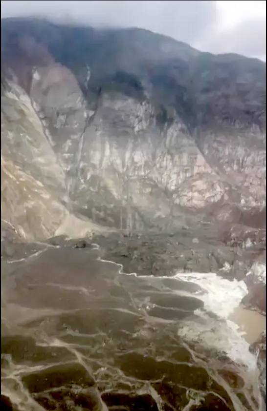 2. A landslide in Southeast Alaska spilled into Tracy Arm and onto South Sawyer Glacier on Aug. 10. Dirt, rock and debris in the lower left part of the image have replaced the fjord’s water. Image from video by Lt. Chip Baucom and Cmdr. PJ Johansen, U.S. Coast Guard.