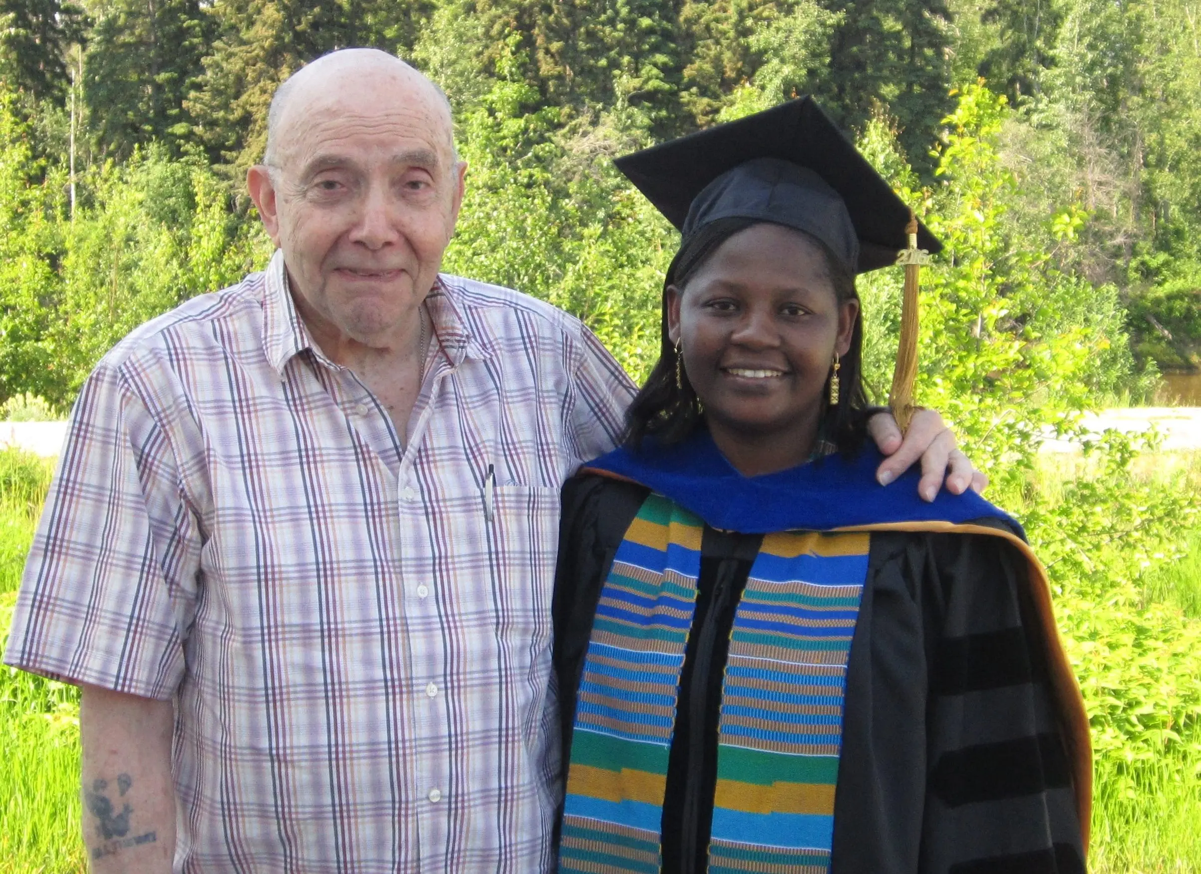 2. Lew Shapiro poses with Josie Sam in 2016 after she earned her Ph.D. degree at the University of Alaska Fairbanks. Photo courtesy of Josie Sam.