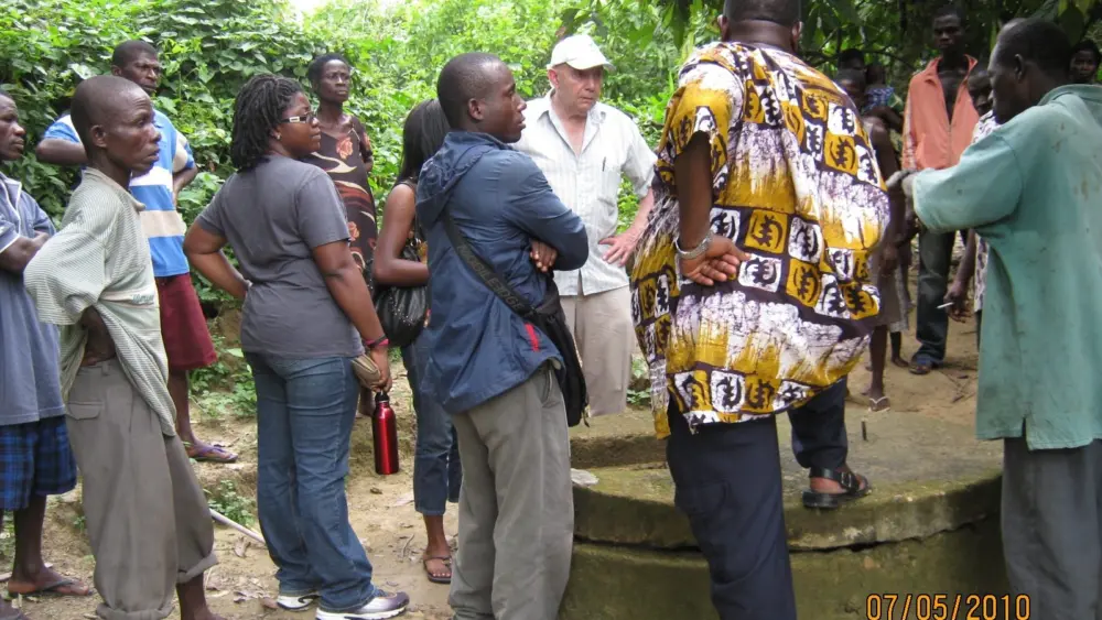 3. Lew Shapiro, in white hat, inspects a potential water system repair project in Ghana on July 5, 2010. Photo by Josie Sam.