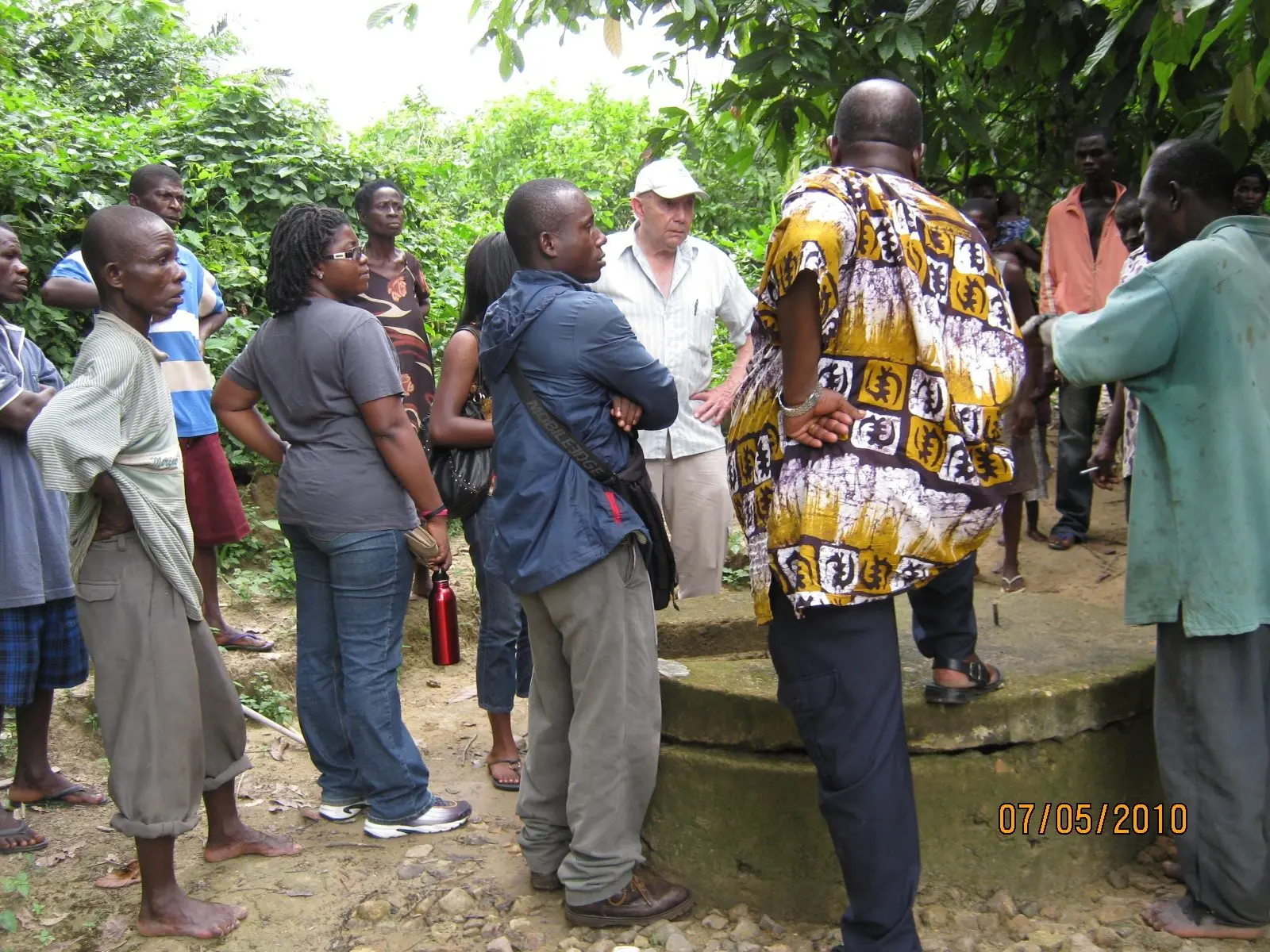 3. Lew Shapiro, in white hat, inspects a potential water system repair project in Ghana on July 5, 2010. Photo by Josie Sam.