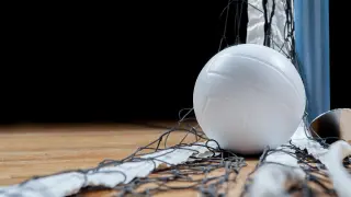 Volleyball and net