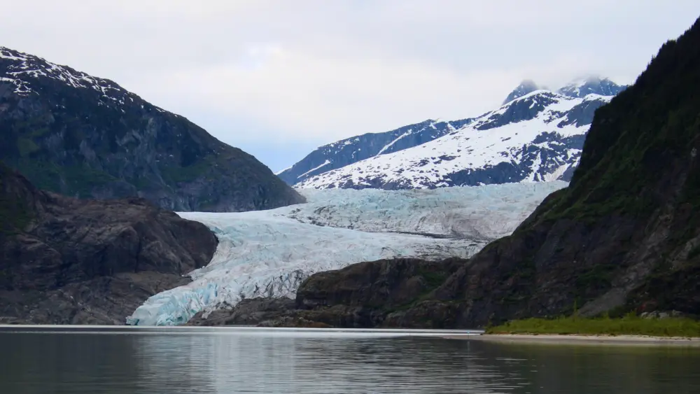 Mendenhall Glacier, here seen in summer 2025, has almost retreated entirely from the lake of its own making. Photo by David Polashenski.