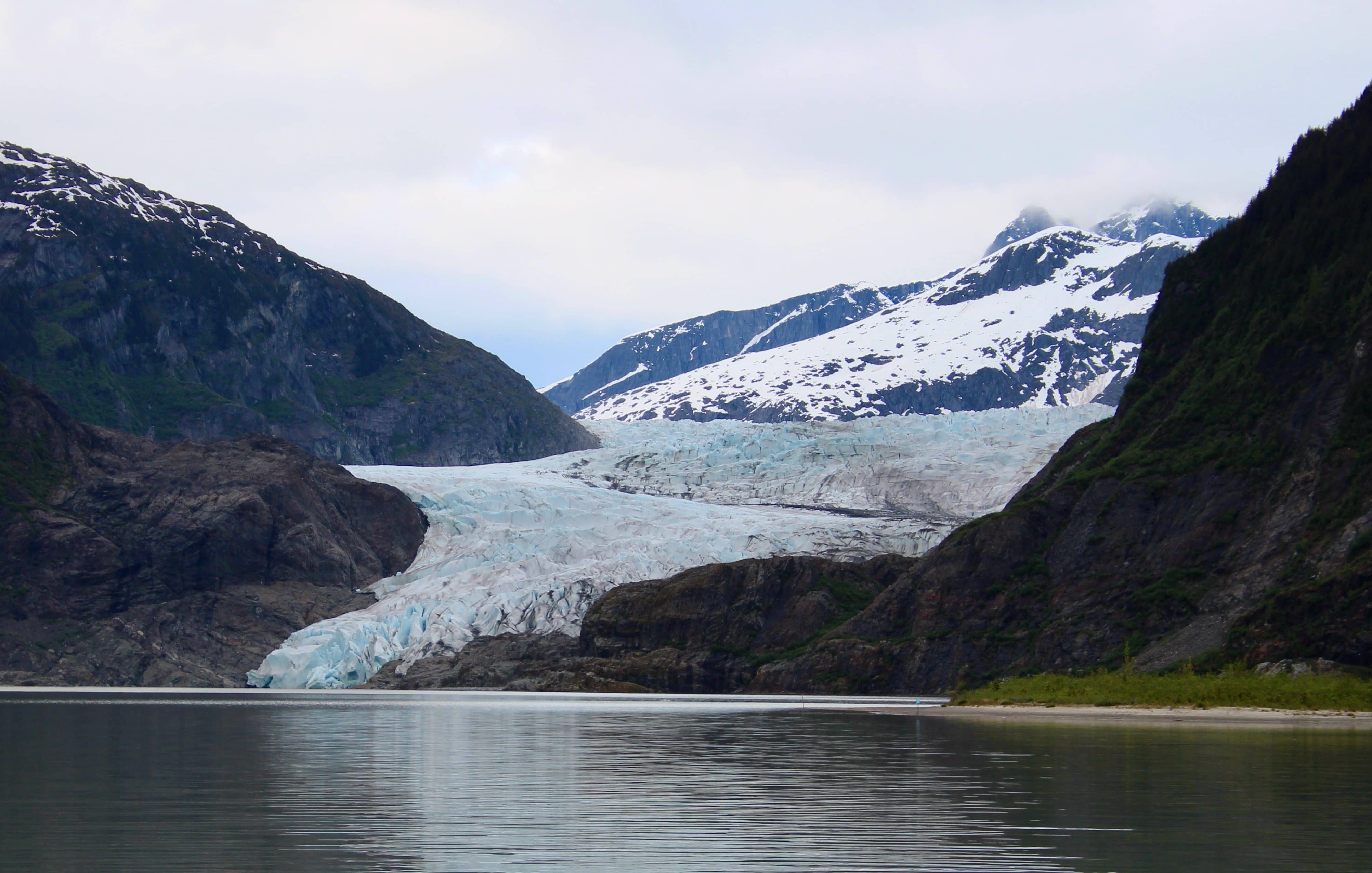 Mendenhall Glacier, here seen in summer 2025, has almost retreated entirely from the lake of its own making. Photo by David Polashenski.