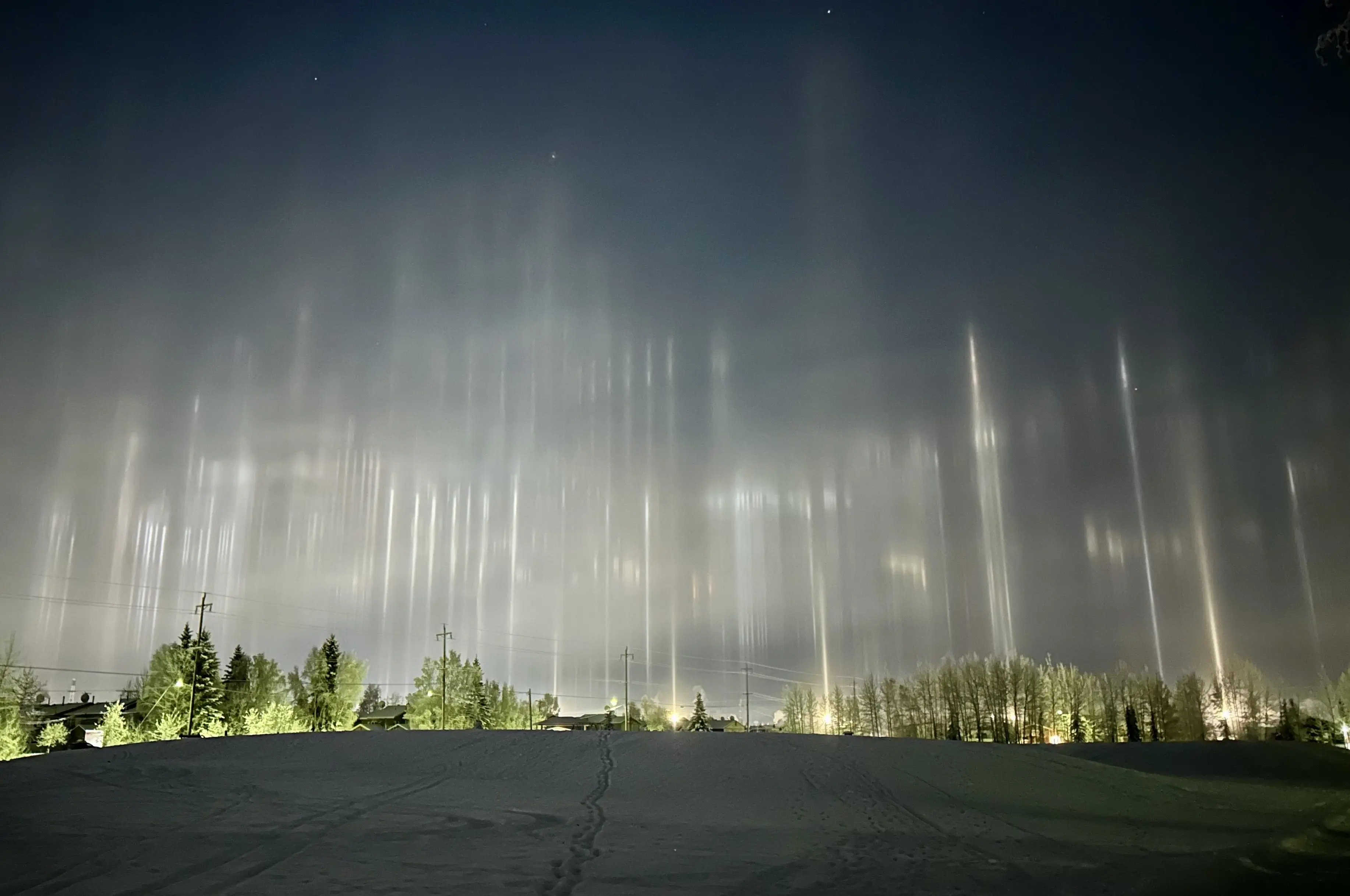 1. Cindy Bravo saw these light pillars in Fairbanks as she was walking her dog Slick through Bernice Allridge Park on Nov. 11, 2025. Photo by Cindy Bravo.