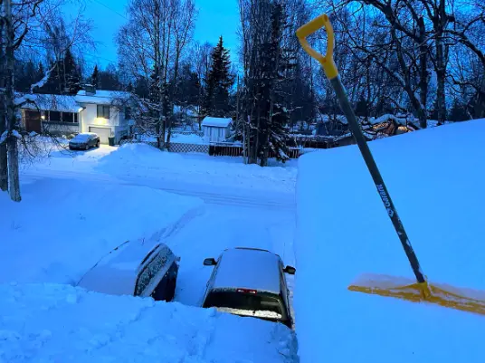 Shoveling snow from roofs is a safety measure in heavy snow loads. Photo by Jennifer Schmidt