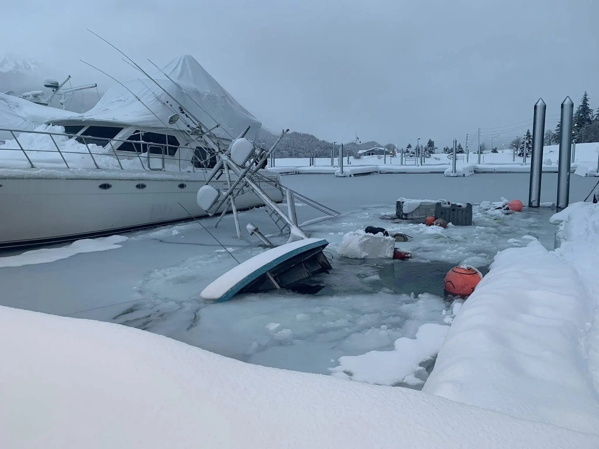 Juneau Harbor weather sinks boats, Jan 2026
