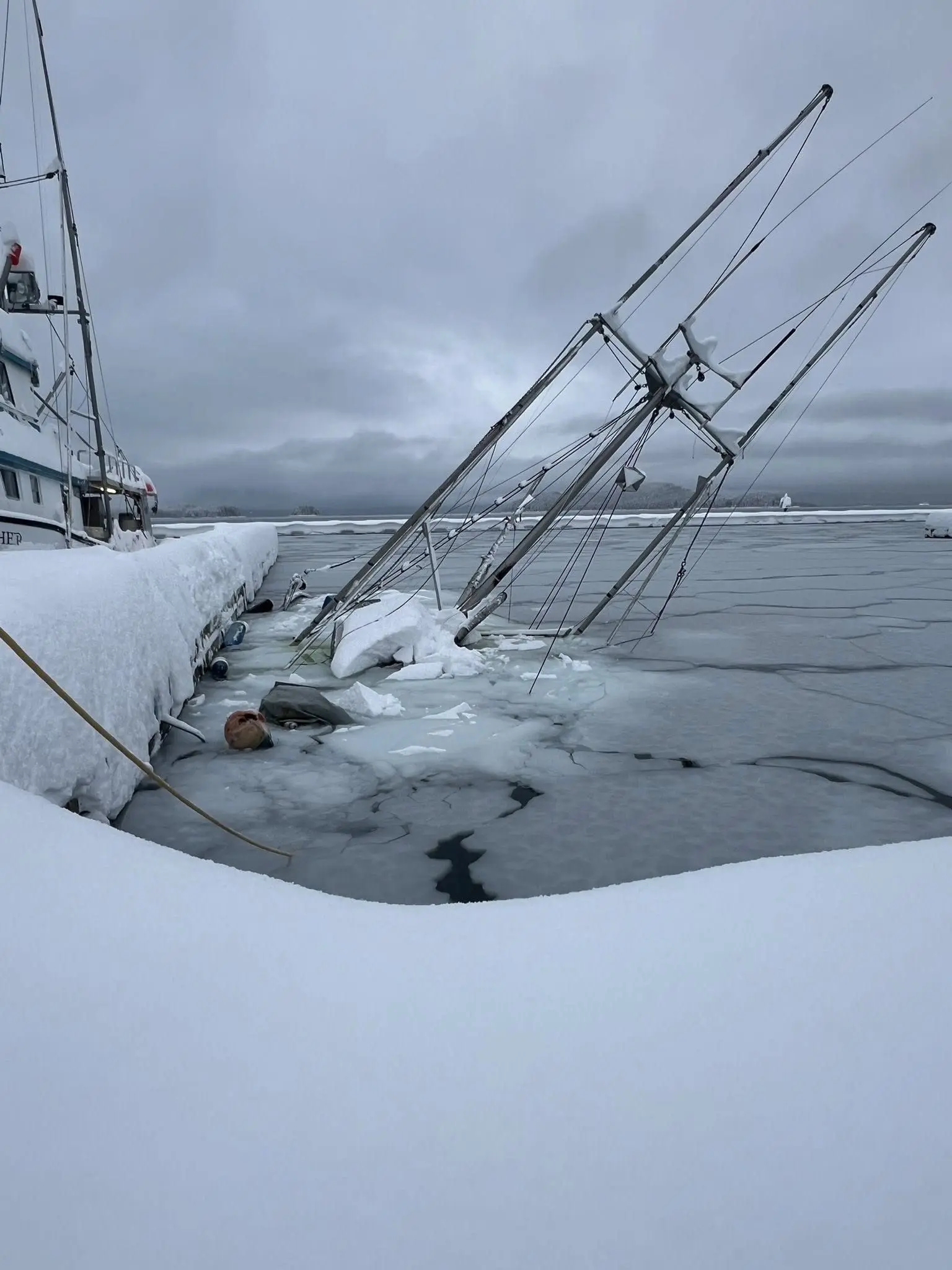 Juneau Harbor weather sinks boats, Jan 2026