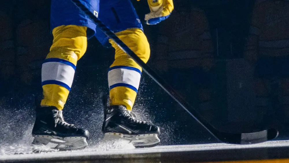 A University of Alaska Fairbanks skater takes the ice against Long Island University in February 2024. UAF photo by Leif Van Cise.