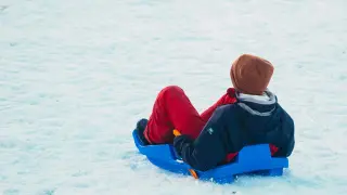 Child on a sled