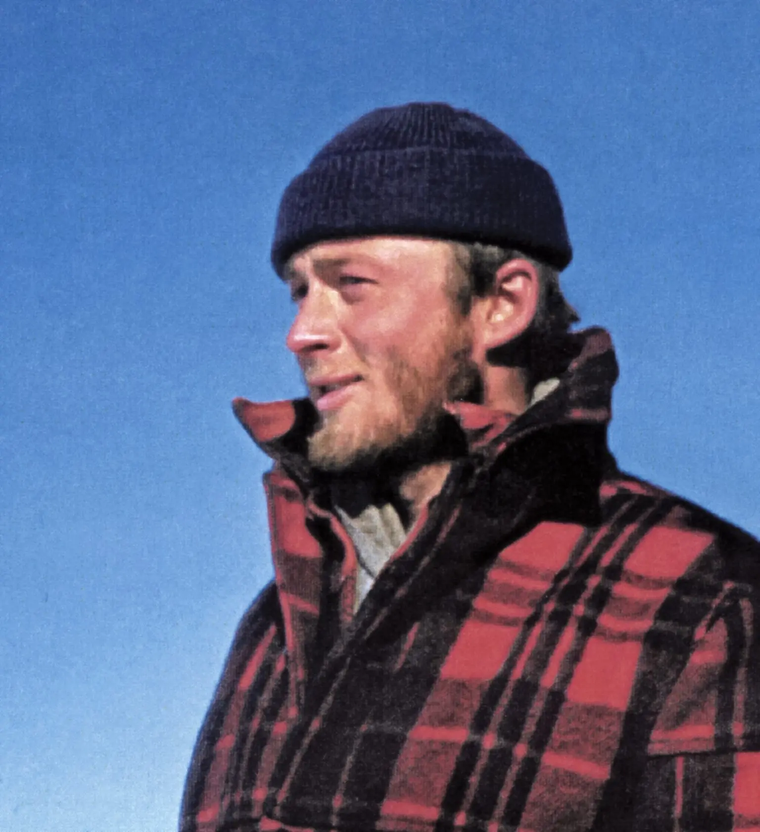 Carl Benson pauses during one of his traverses of Greenland in 1953, when he was 25. Photo courtesy of the UAF Geophysical Institute.