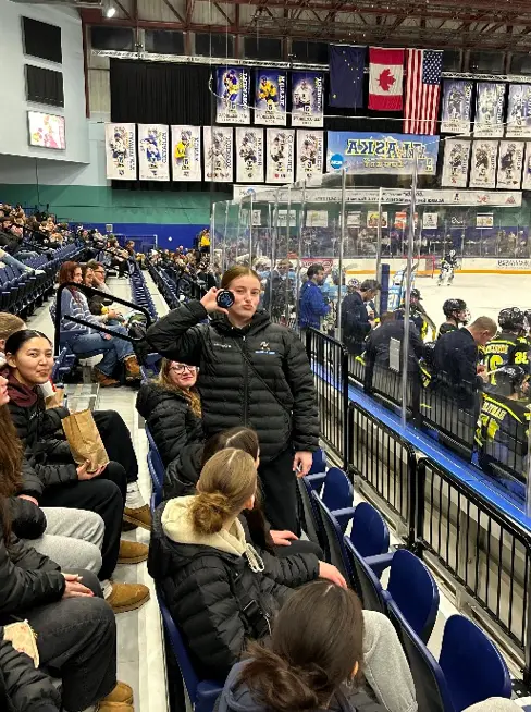 Lady Bucs at the West Valley Ice Jam Tournament Jan 2026. The team was able to attend a UAF Hockey game and one student got a puck. 
