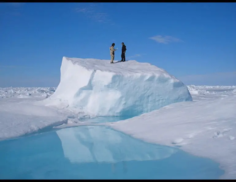 Matt Druckenmiller, right, and his research advisor Hajo Eicken, a professor of Geophysics, on an ice floe near Utqiaġvik in about 2010. Photo by Daniel Pringle.