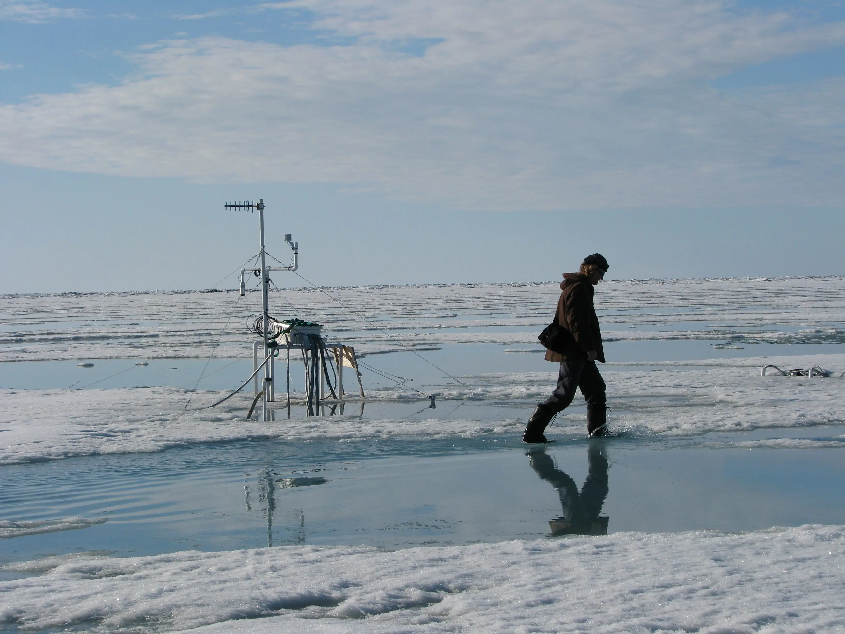 Hajo Eicken walks the sea ice off the town of Utqiaġvik in about 2010. Photo by Matt Druckenmiller.