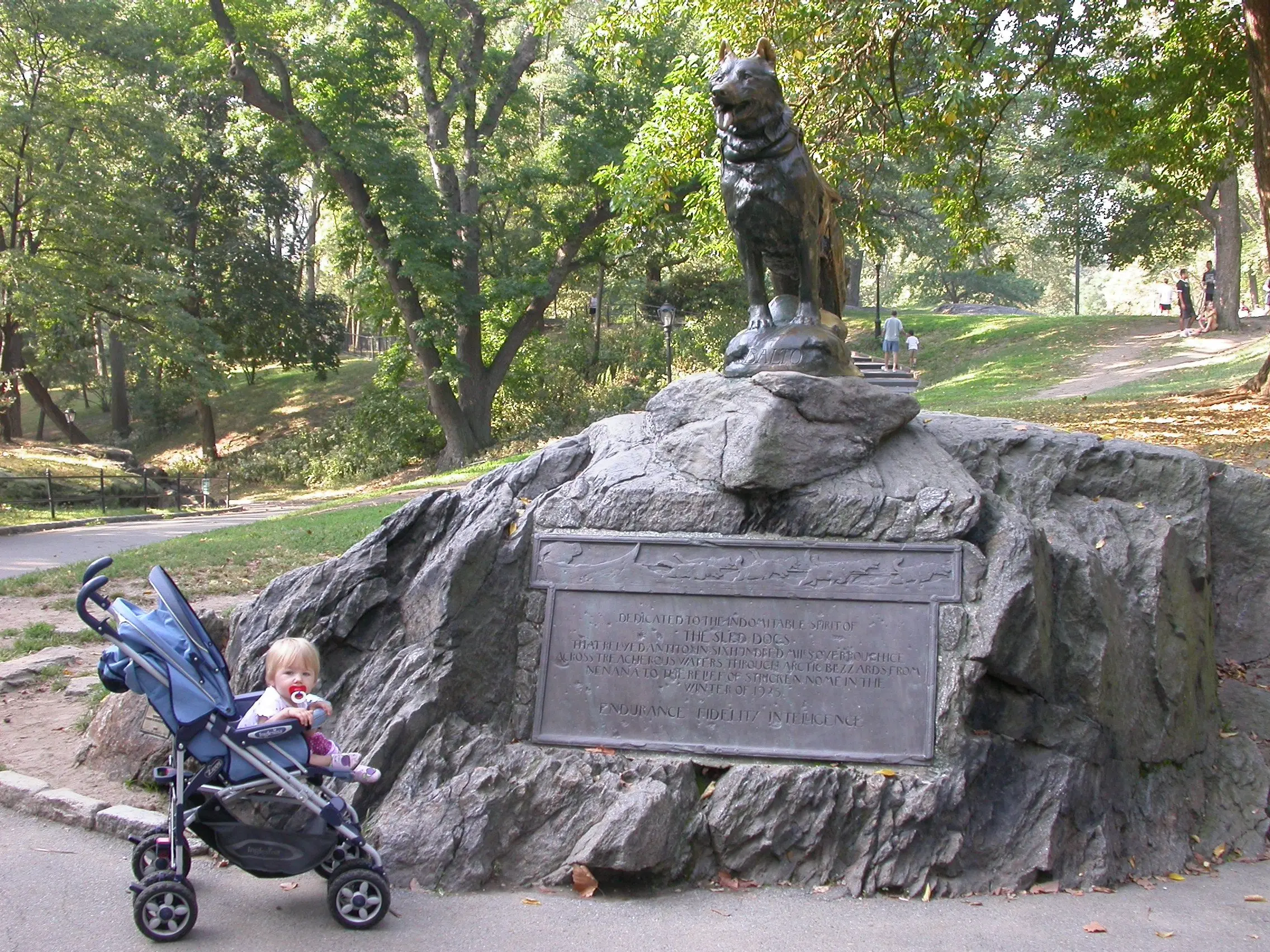 In October 2007, one-year-old Anna Rozell admired a statue of Balto in Central Park of New York City. Photo by Ned Rozell.
