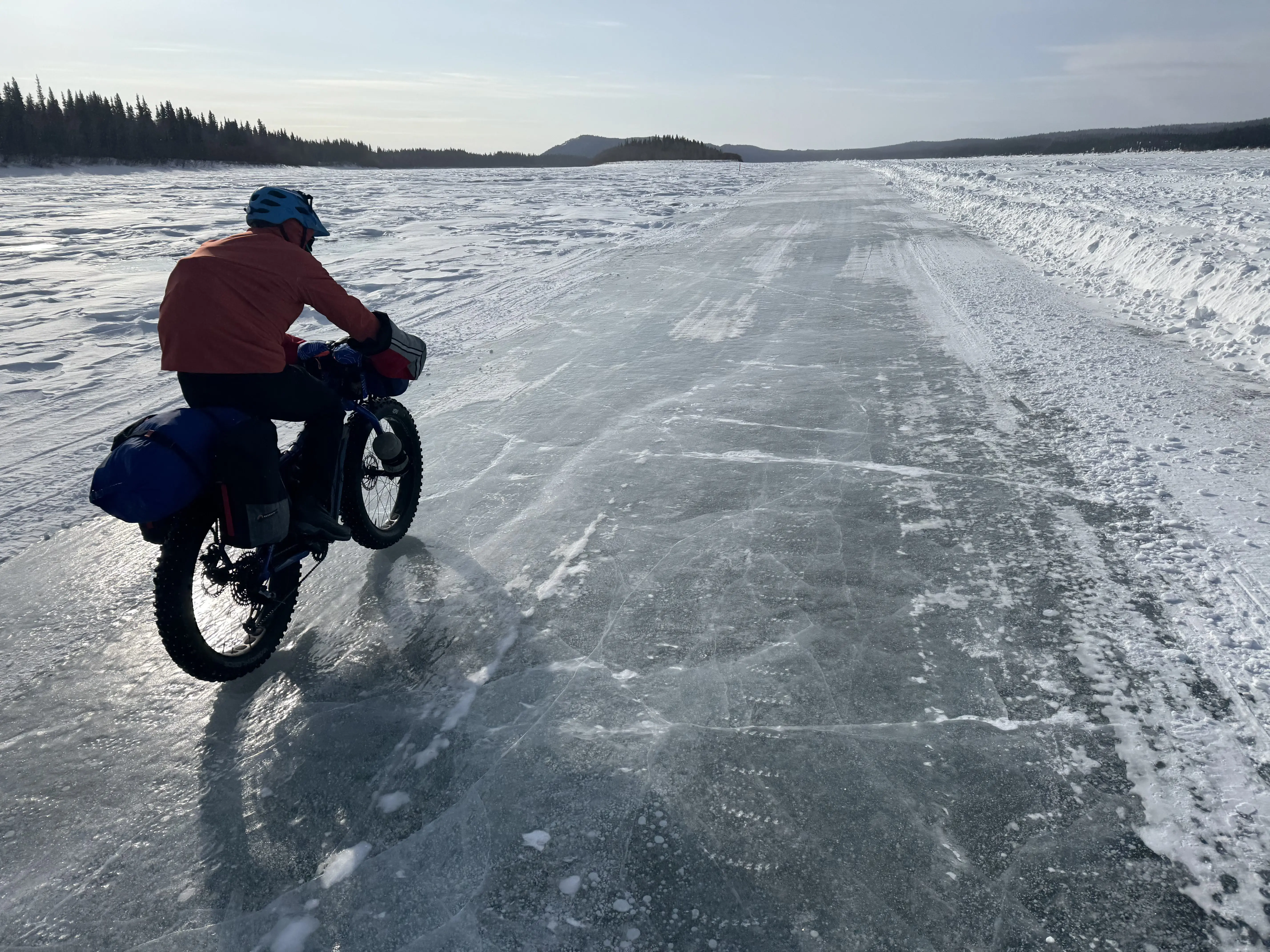 1. Ned Rozell rides a plowed winter road on the Yukon River that allows cars and trucks to drive between Manley Hot Springs and the village of Tanana in the winter. Photo by Forest Wagner.