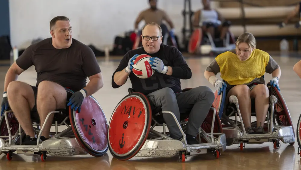 USCG MK2 Bill Hamilton plays in a wheelchair rugby scrimmage during the Navy Team Trials - US Navy photo by MC3 Joey Sitter.