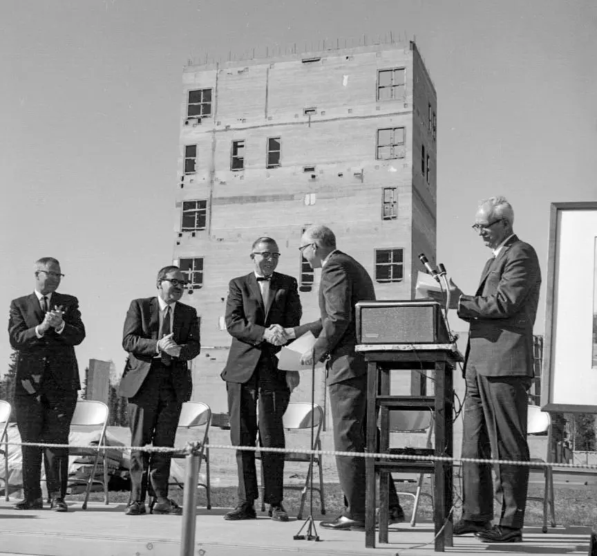 University President William Wood shakes C.T. Elvey’s hand at ceremonies to dedicate the Elvey Building in May 1969. Photo from Geophysical Institute archives
