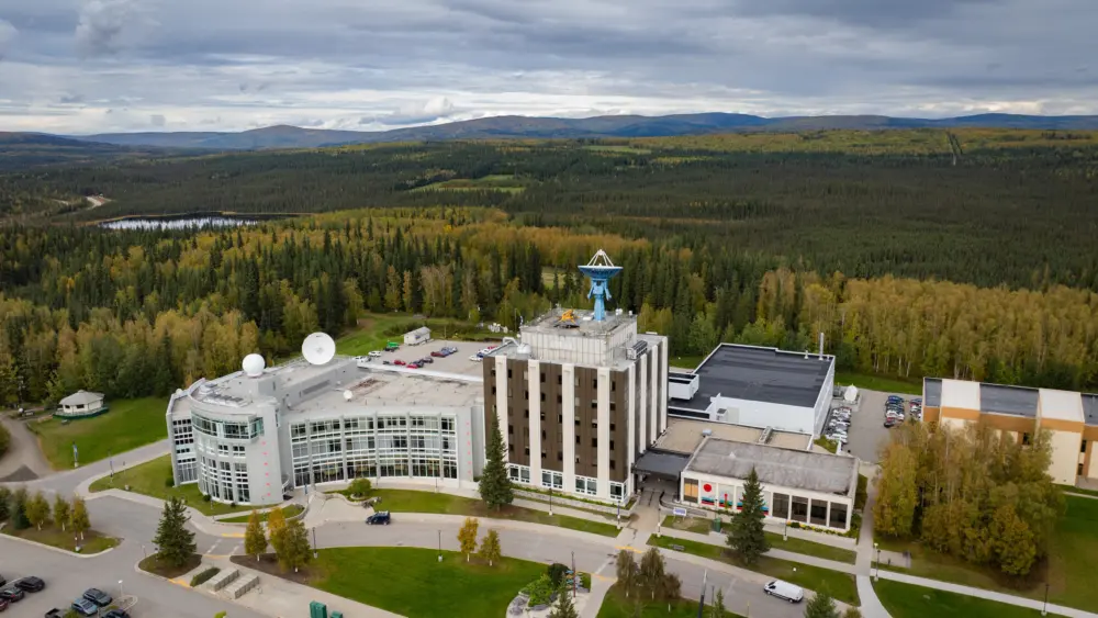The C.T. Elvey Building, center, is home to the University of Alaska Fairbanks Geophysical Institute. At left in this 2025 photograph is the Syun-Ichi Akasofu Building, which houses many Geophysical Institute researchers, including those of the Alaska Center for Unmanned Aircraft Systems Integration. The Akasofu Building is also home to another UAF research unit, the International Arctic Research Center. Photo by Eric Marshall