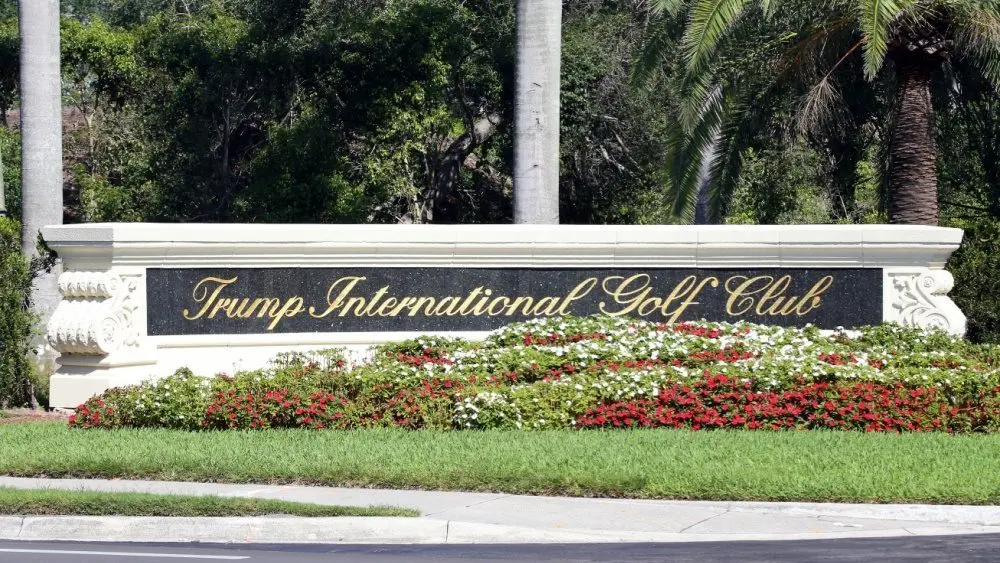 An Entrance to Trump International Golf Club in West Palm Beach^ Florida on April 25^ 2018. Trump International Golf Club is owned by President Donald J. Trump. WEST PALM BEACH^ FL^ USA - APRIL 25