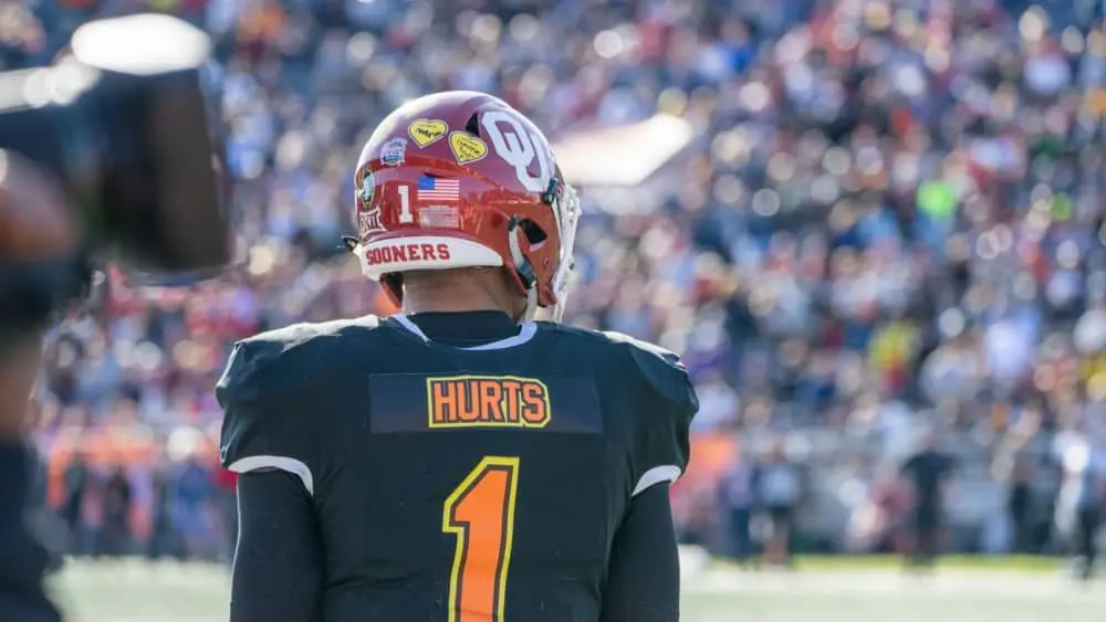 QB Jalen Hurts looks onto the field during 2020 Senior Bowl football ball game Mobile^ Alabama USA - January 25 2020