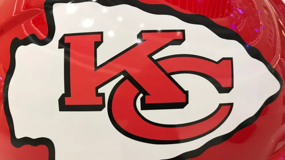 Closeup of Kansas City Chiefs helmet^ white and red^ displaying 'KC' logo