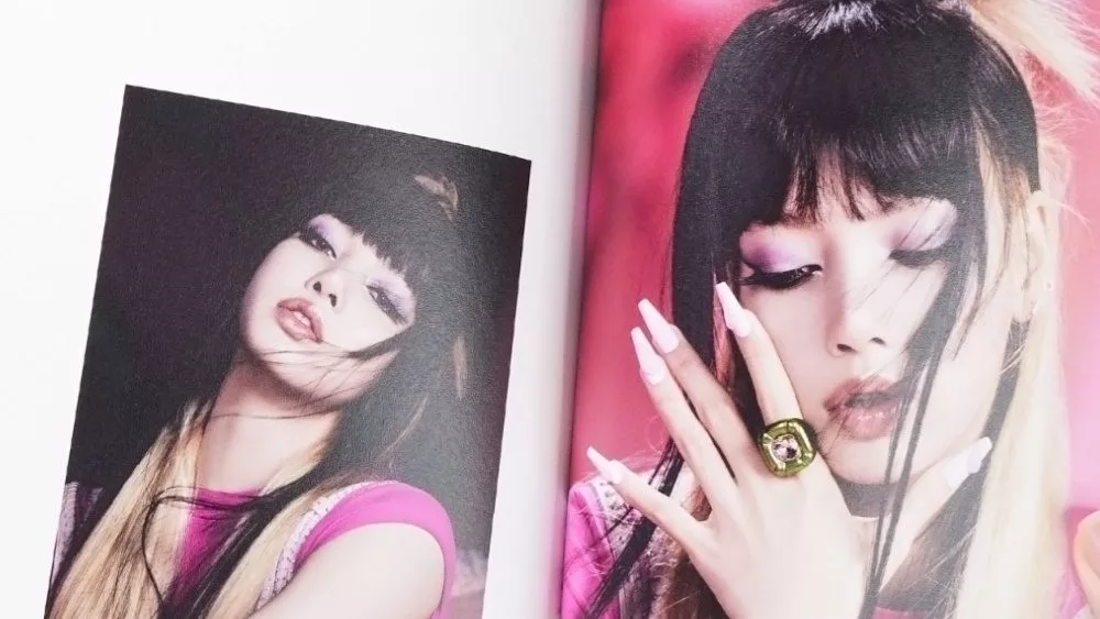 BlackPink BORN PINK 2nd Album photobook with Lisa on grey.