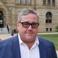 karlin-headshot-e1658143363567-200x200398457-1