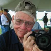 Former Register-Mail Editor and longtime board member of the National Stearman Fly-in poses for a photo at the 2015 Stearman Fly-in