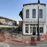 Demolition of the fire-damaged buildings 140-144 E. Main St. got underway Monday^ March 18^ 2024.