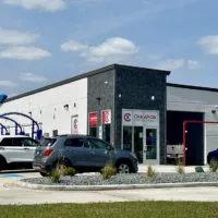 Champion Xpress Carwash served its first customers early Thursday^ Aug. 22^ 2024^ at 1819 N. Henderson St. The tunnel car wash is open from 7:30 a.m. to 7 p.m. seven days a week.