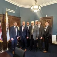 From left: Director of Public Works Aaron Gavin^ Congressman Eric Sorensen^ City Manager Eric Hanson^ KCAP Board Chairman John Pritchard^ KCAP President Ken Springer^ KCAP Secretary/Treasurer Josh Gibb and KCAP Vice Chairman Adam Vitale.
