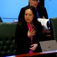 Rep. Janet Yang-Rohr urges passage of a bill to let high school athletes compete simultaneously on school teams and in non-school events during debate on the House floor Wednesday^ April 9. (Capitol News Illinois photo by Andrew Campbell)