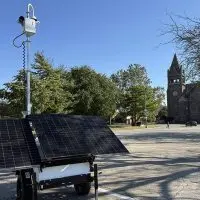 A mobile security camera^ operated by the Galesburg Police Department^ sits on the northwest corner of the Public Square in downtown Galesburg.