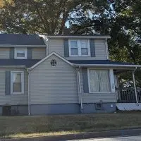 The residence at 30 N. Soangetaha Road where Georgette Evan Rodrigues was found dead Sunday.