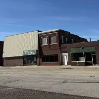 The four buildings slated for demolition at 224-240 S. Seminary Street (shown here just to the right of the still-operating Penn’s Used Furniture^ far left) could come down as soon as the City Council approves the contract Monday night.