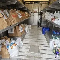 Food donations fill the shelves of a UPS truck Saturday^ Nov. 8 at the Community Food Drive benefitting FISH of Galesburg.