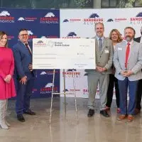Sandburg on Tuesday announced the naming of the Graham Health System Science & Technology Center Atrium following a $500^000 commitment by Graham Health System in support of student success. Pictured L-R: Kassidy Klinedinst^ Sandburg assistant manager of advancement; Bob Senneff^ Graham Health System CEO; Allison Sours^ Graham Health System president & COO; Dr. Seamus Reilly^ Sandburg president; Eric Rahn^ director of Graham Medical Group’s western region; Michelle Daly^ Graham Health System senior vice president of clinic operations; Eric Johnson^ Sandburg vice president of advancement; Jake Green^ Graham Health System senior director of business development; Deborah Moreno^ Sandburg Foundation president; and Stacey Rucker^ Sandburg assistant manager of alumni engagement & advancement communications. (BILL GAITHER/Sandburg)
