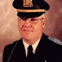 Michael DeForest in Galesburg Police Department uniform as sergeant^ longtime captain who retired in 2001.