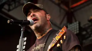 Aaron Lewis plays his guitar druing the performance of Staind Rockstar Uproar Festival on September 25^ 2012 in Nampa^ Idaho.