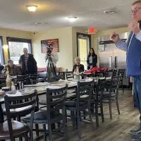 Republican gubernatorial candidate Darren Bailey speaking at Tres Cafe in Galesburg^ Illinois