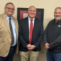 United CUSD 304 Superintendent Tom Hawkins^ incoming principal Michael Washabaugh^ and board president Scott Campbell