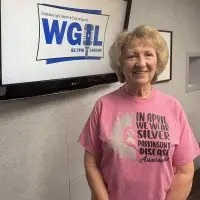 Marcia Parrish wearing a Parkinson's Disease Awareness shirt at the WGIL studio