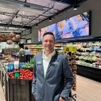 Craig Norrenberns^ a fourth-generation Illinois grocer^ poses in one of the four independent groceries he owns in southern Illinois. Norrenberns testified before a House committee about the potential impacts SNAP cuts will have on independent grocers. (Photo courtesy Norrenberns)