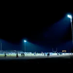 Football,Competition,At,Night,In,Stadium: football competition at night in stadium
