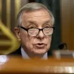 FILE - Chairman Sen. Dick Durbin^ D-Ill.^ speaks during a Senate Judiciary Committee Hearing to examine a post-Roe America^ focusing on the legal consequences of the Dobbs decision^ on Capitol Hill in Washington^ Tuesday^ July 12^ 2022. Durbin said he tested positive Thursday^ July 28^ for COVID-19 and was in quarantine with what he described as minor symptoms. The No. 2 Senate Democrat^ who said in a statement he was vaccinated and had received two booster shots^ planned to continue to work remotely.(AP Photo/Andrew Harnik^ File