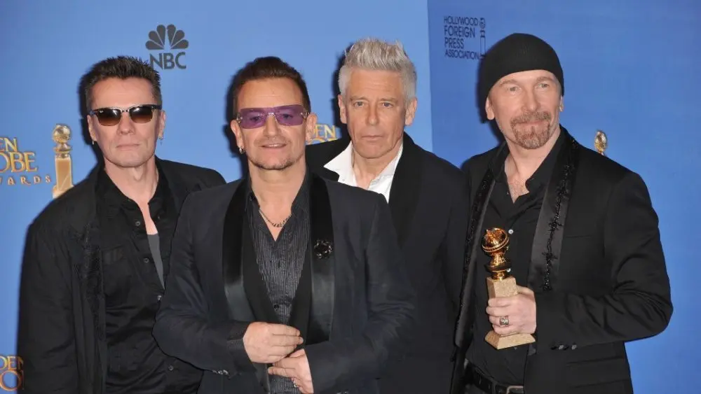 U2 with Bono & The Edge in the press room at the 71st Annual Golden Globe Awards LOS ANGELES^ CA - JANUARY 12^ 2014