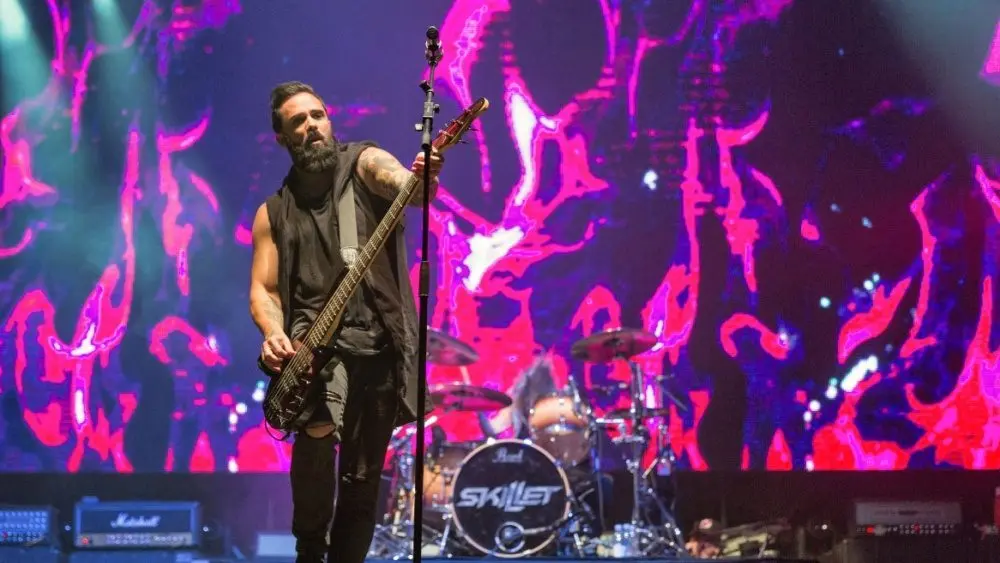 American Christian metal rock band Skillet and John Cooper^ lead vocalist and bass guitarist performs live at the Atlas Weekend Festival in National Expocenter. KIEV^ UKRAINE - JULY 04^ 2018