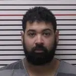 Marcus Moultrie’s mugshot^ provided by the Jackson County Jail