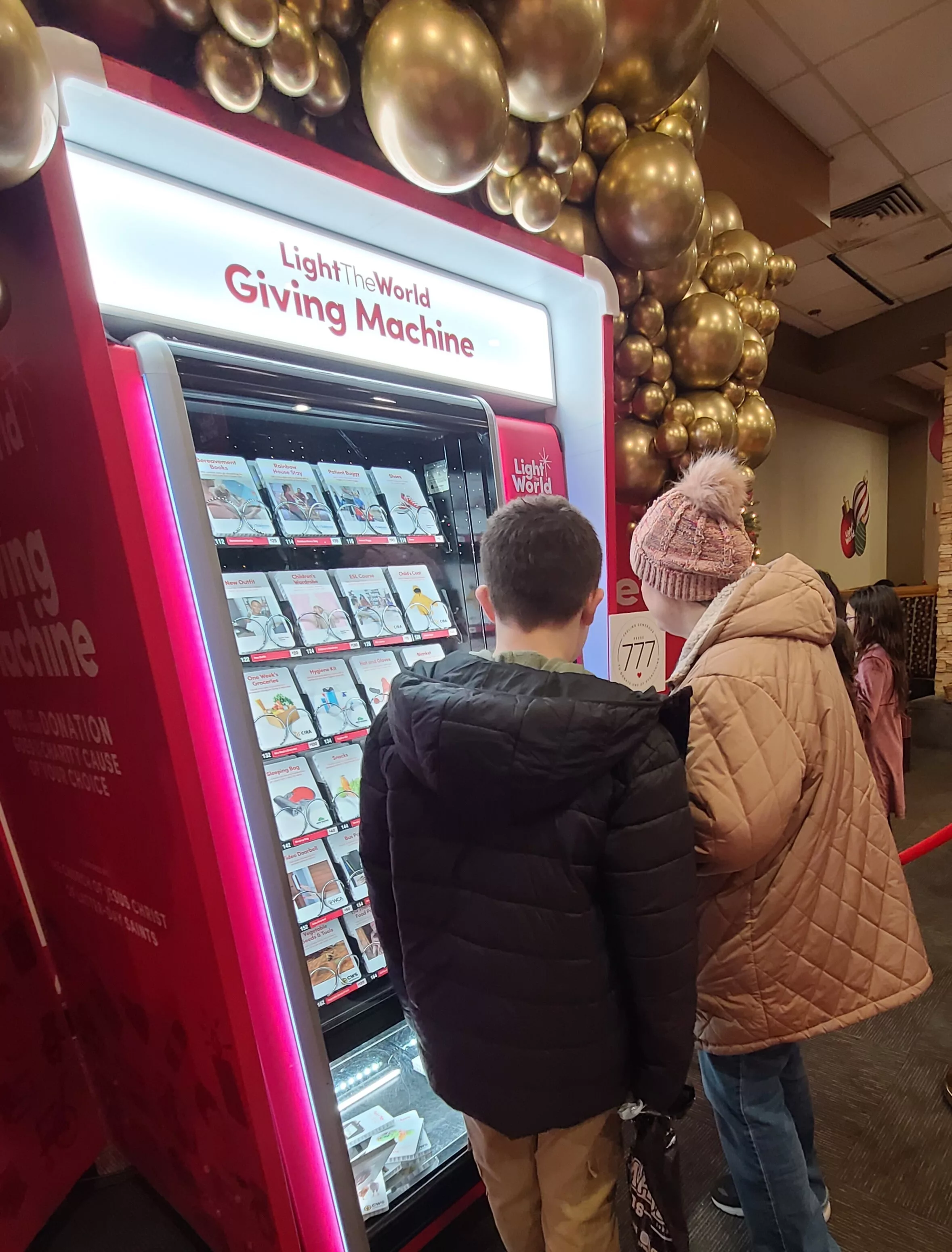 woman-son-make-giving-machine-omaha-donation